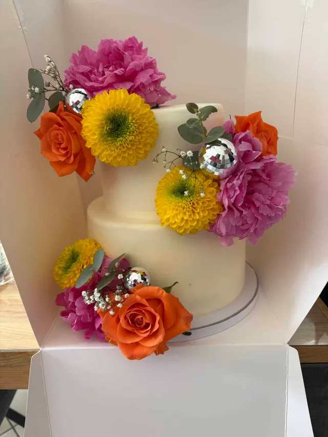 Layer cake baptême thème fushia et orange